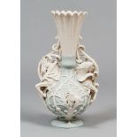 BEAUTIFUL BISCUIT AND PORCELAIN VASE, 20TH CENTURY Measurements cm. 35 x 22 x 26.