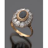 OLD RING in yellow gold with central sapphire and contour of twelve roses of diamonds. weigh gr. 5,