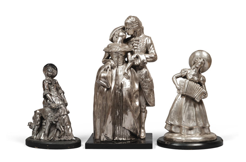 THREE SILVERED CERAMIC GROUPS, 20TH CENTURY representing gallant scene, musician and woman with
