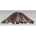 TWENTY-ONE WALKING STICKS AND BATONS, LATE 19TH, EARLY 20TH CENTURY with different handles, with