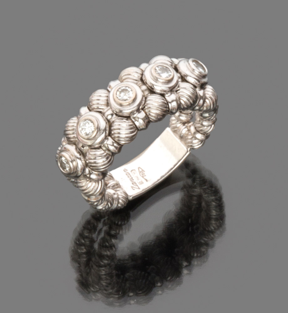 RING in white gold 18 kts., with five diamonds. Diamond ct. 0.25 ca., total weight gr. 8,70.