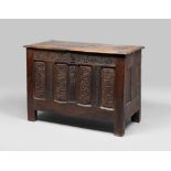 OAK CHEST, ENGLAND DATED 1661 rectangular hood, front panels with insert and with plant motifs and