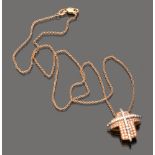 BEAUTIFUL NECKLACE in white and pink gold 18 kts., with cross pendant stormed of diamonds. Length