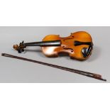 VIOLIN, 20TH CENTURY with bow. Measurements cm. 4,5 x 21 x 59.