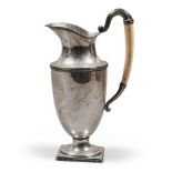 A BEAUTIFUL SILVER SPOUT, ITALY 20TH CENTURY smooth body with square base and handle in bone.