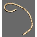 A BEAUTIFUL SEMIRIGID NECKLACE white and yellow gold 18 kts. Length cm. 42, weight gr. 50,80.