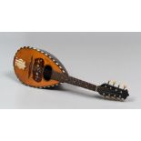 MANDOLIN, NAPLES LATE 19TH CENTURY with rose-wood body with inlays in madreperla. Engraved