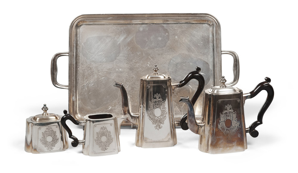 SILVER TEA AND COFFEE SERVICE, ITALY, FLORENCE 20TH CENTURY with coats of arms incisions. Handles in