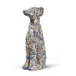 HEARTHENWARE DOG FIGURE, 20TH CENTURY gray enamel, with decorations in cobalt blue and flowers.