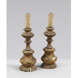 A PAIR OF LACQUERED WOOD CANDLESTICK, 18TH CENTURY h. cm. 34.