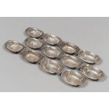 TWELVE SILVER TRAYS, USA FIRST HALF 20TH CENTURY Measurements cm. 1 x 8 x 5,5, total weight gr.
