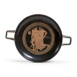 BLACK-FIGURES KYLIX, EARLY 20TH CENTURY in clay and shining black glaze. Tub with smooth edge,