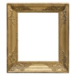 GILDED WOOD FRAME, EARLY 19TH CENTURY with decorums to palmette at the corners. Inner measures,