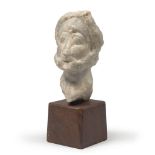 SMALL MARBLE SCULPTURE, NON DEFINABLE EPOCH representing head of man. Measures cm. 13 x 6 x 9.