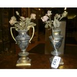 A PAIR OF SILVERED METAL POTS, 19TH CENTURY with flowers in lacquered metal and sideburn in wood. H.