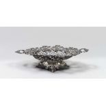 SILVER CENTREPIECE, EARLY 20TH CENTURY with tub pierced to network and hurled to cornucopia.