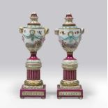 A PAIR OF SMALL PORCELAIN CASSOLETTES, BERLIN EARLY 20TH CENTURY in polychrome with decorums to