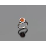 RING in white gold 18 kts. Opal ct. 1.00 ca., bright ct. 0.40 ca., total weight gr.4,90. BEL