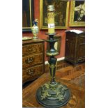 EBONY CANDLESTICK, PERIOD NAPOLEONE III with finishes in metal burnished to leaves and perlatura. h.