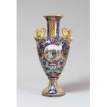 CERAMIC VASE, GUALDO TADINO FIRST HALF 20TH CENTURY with decorum to leaves of cakes and birds and