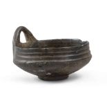 ETRUSCAN HANDLED CUP, 7TH CENTURY B.C. impasto purified brown polished stick. vertical edge of