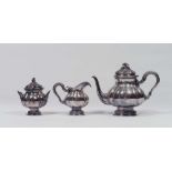 SILVER SET OF TEA, 20TH CENTURY engraved to motive for leaves of acanthus twisted with group of