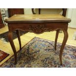 GAME TABLE IN CIULIEGIO, 19TH CENTURY with book plan and forehead carved to vegetable motives.