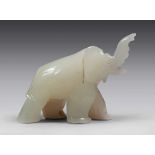 AN INDIAN MOONSTONE SCULPTURE, 20TH CENTURY depicting an elephant. Measures cm. 18 x 20 x 9.