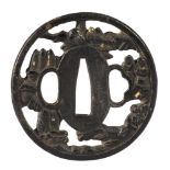 A JAPANESE DECORATED IRON SAMURAI HAND-GUARD OF SWORD, 19TH CENTURY Measures cm. 6,7 x 6,5.