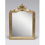 GILDED WOOD MIRROR, 19TH CENTURY with frame modanata and graven cyma to volutes, flowers and