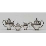 SILVER SET OF COFFEE AND TEA, ITALY 1944/1968 with cymas and feet chiseled in fusion. Handles with