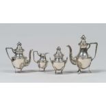 SILVER SET OF COFFEE AND TEA, 20TH CENTURY with elements chiseled to tied up racemi and climbing