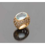 RING in yellow gold 18 kts. Aquamarine ct. 9.00 ca., bright ct. 1.40 ca., total weight gr. 14,80.