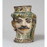 MAJOLICA VASE, CALTAGIRONE, 19TH CENTURY shaped to masculine face to enamels. Decorated mouth to