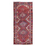 HAMADAN CARPET, EARLY 20TH CENTURY to triple medallion and secondary motives to flowers and