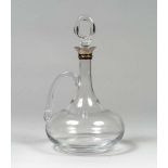 GLASS CARAFE, CARTIER XXTH CENTURY Mark engraved under the base. Measures cm. 27 x 20 x 21.