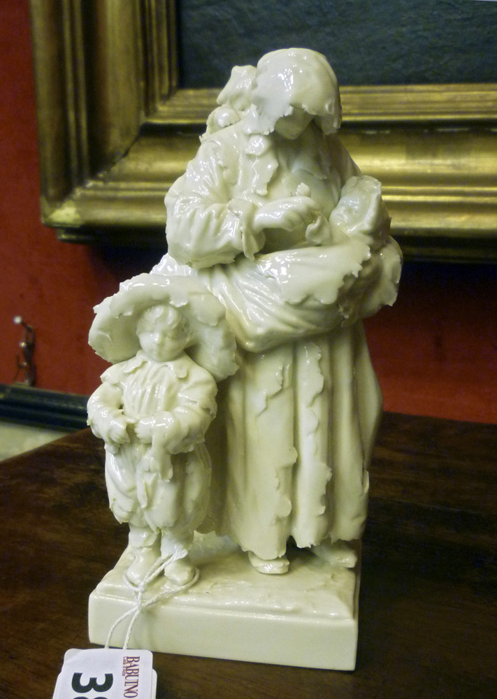 GROUP IN PORCELAIN, PROBABLY GINORI FINE 19TH CENTURY representing the mendicant. It Marks in blue