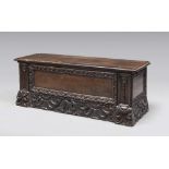 A RARE WALNUT CHEST, PROBABLY LOMBARDY 17TH CENTURY Subject to the front of pods and palms, side