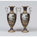 A PAIR OF PORCELAIN VASES, 20TH CENTURY Mark under the base. Measures cm. 52 x 25 x 21. COPPIA DI