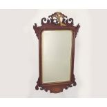 GEORGIAN MIRROR. A Georgian carved & walnut veneered mirror, with gilt gesso decoration.