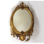 MIRROR. A 19th century gilt moulded mirror. 98 x 56cm.