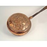 WARMING PAN. A 19th century copper warming pan, with iron fixing & later turned wood handle.