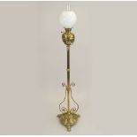 OIL LAMP. A Victorian brass standard oil lamp, now converted to electricity. Height 154cm.