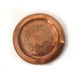 WALLIS COPPER. A Wallis copper tray, probably by Brian Wallis. Stamped 'HW' monogram. Diameter 29cm.