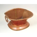 COPPER SCUTTLE. An unusual flat back, twin handled copper coal scuttle.