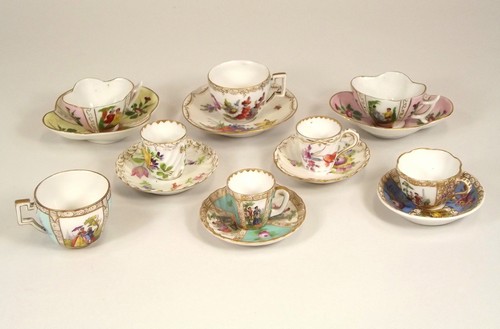 DRESDEN ETC. A small collection of Dresden & other miniature cabinet cups & saucers.