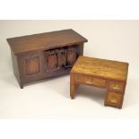 MINIATURE FURNITURE. A stained oak miniature coffer, 23x11.5x13cm & an oak miniature pedestal desk.