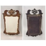 MIRROR. A 19th century walnut mirror with gilt eagle finial.