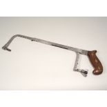 STEEL HACKSAW. A good quality mahogany, brass & steel adjustable hacksaw.