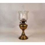 OIL LAMP. A brass oil lamp, with etched shade. Height 56cm.